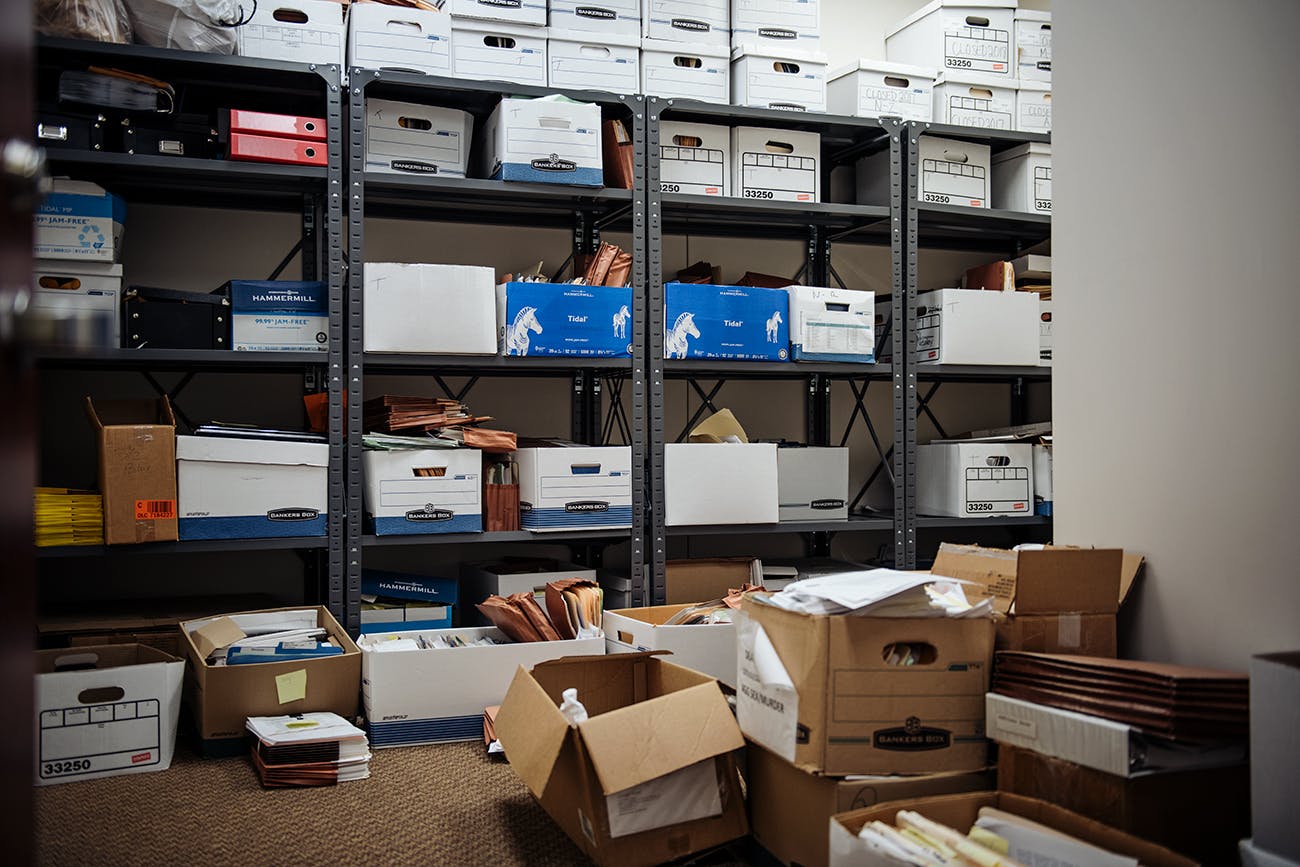 Boxes of case files at the Harris County public defender’s office, in Houston.