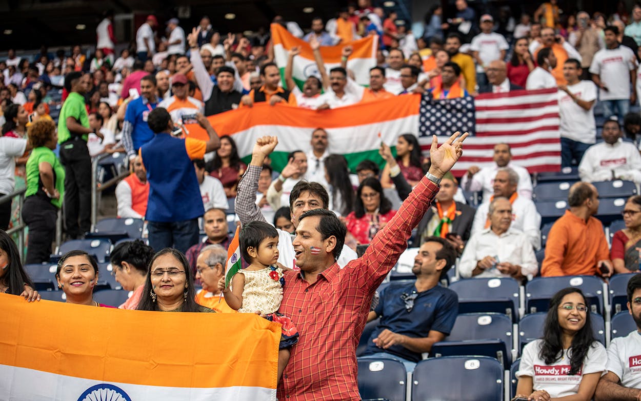 Attendees chant and cheer inside NRG Stadium ahead of a visit by Indian Prime Minister Nerenda Modi on September 22, 2019 in Houston.