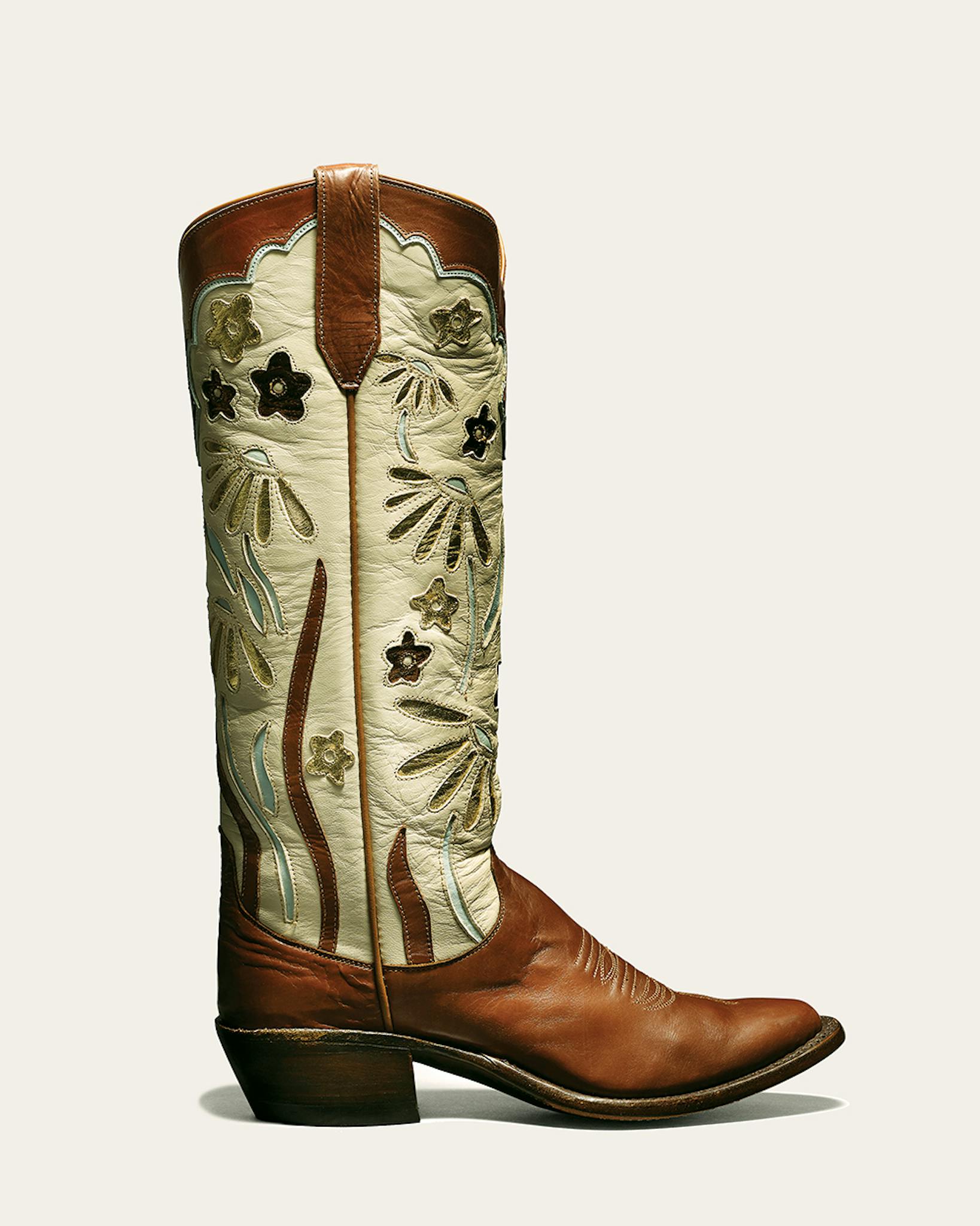Miron Crosby boot with brown vamp and white shaft with flowers.