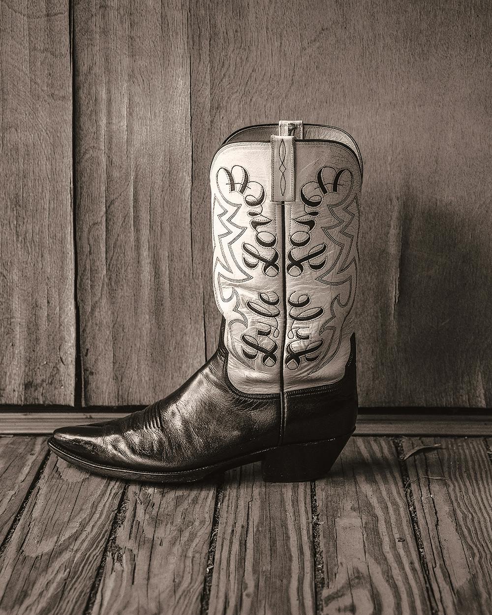 Lyle Lovett's cowboy boots, with his name on them, designed by his wife. 
