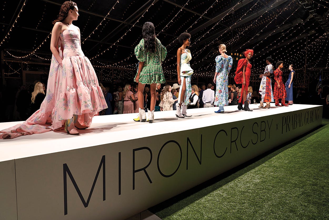 Models walk the runway during the launch celebration of the Miron Crosby boot line designed in partnership with Prabal Gurung.