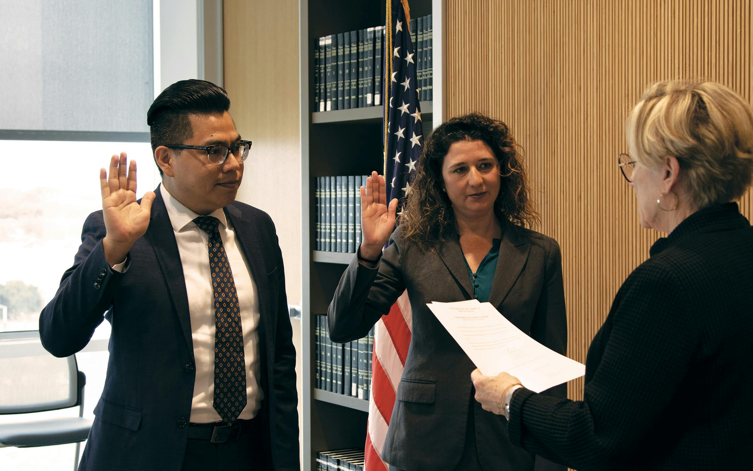 District Attorney Margaret Moore (far right) swearing in Villalobos (left) and fellow lawyer Gwen Jacobs in Austin on December 16, 2019.