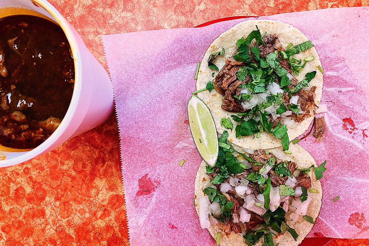Birria tacos and consomme sauce from Lucas Tacos. 