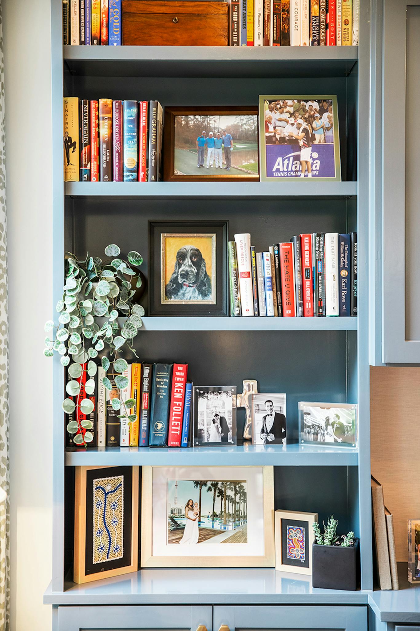 Madison McKinley Isner's bookshelf in her study.