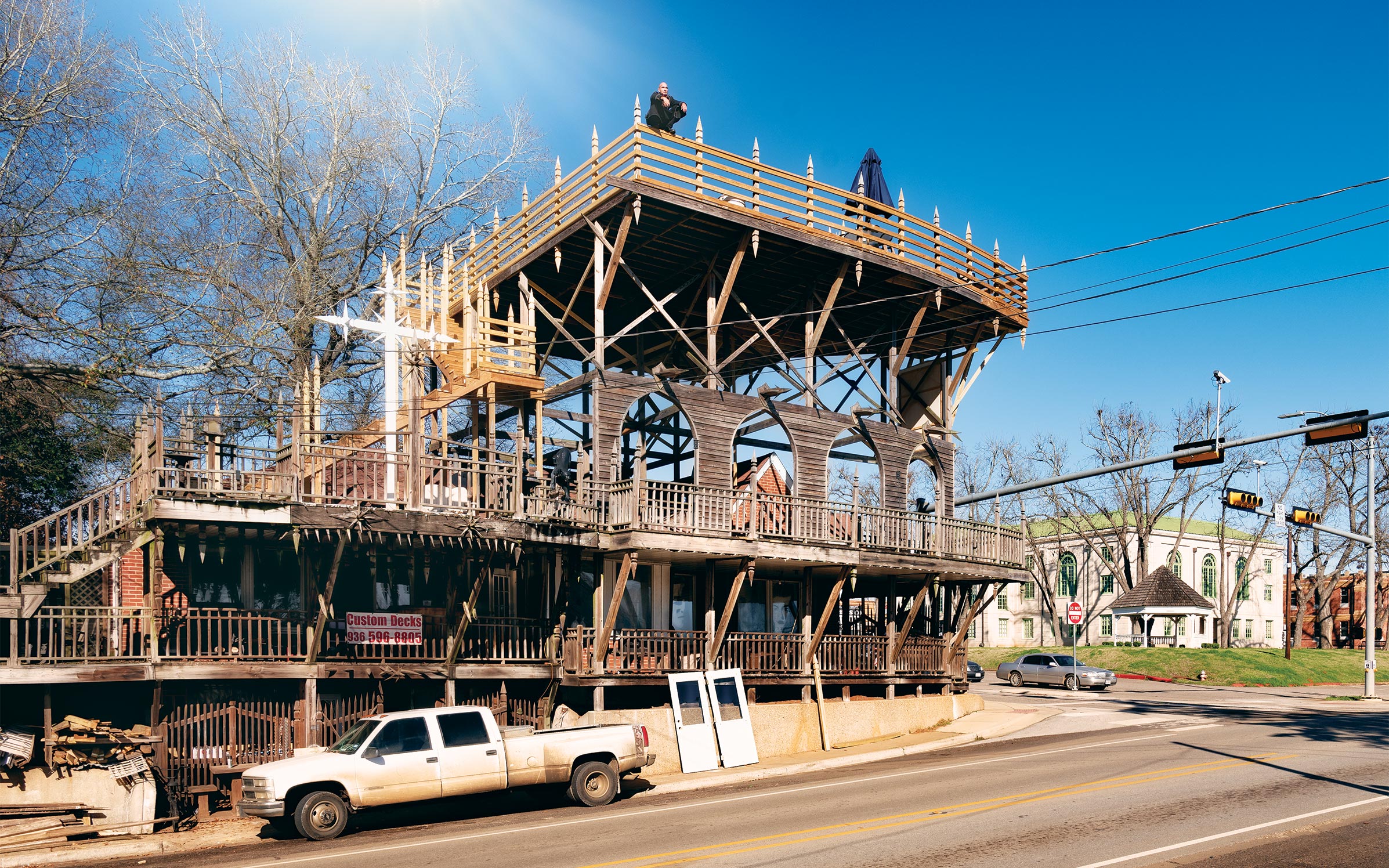 For Years, an East Texas Carpenter Has Been Building a Gothic Contraption of Decks and Spikes in a Historic Square pic