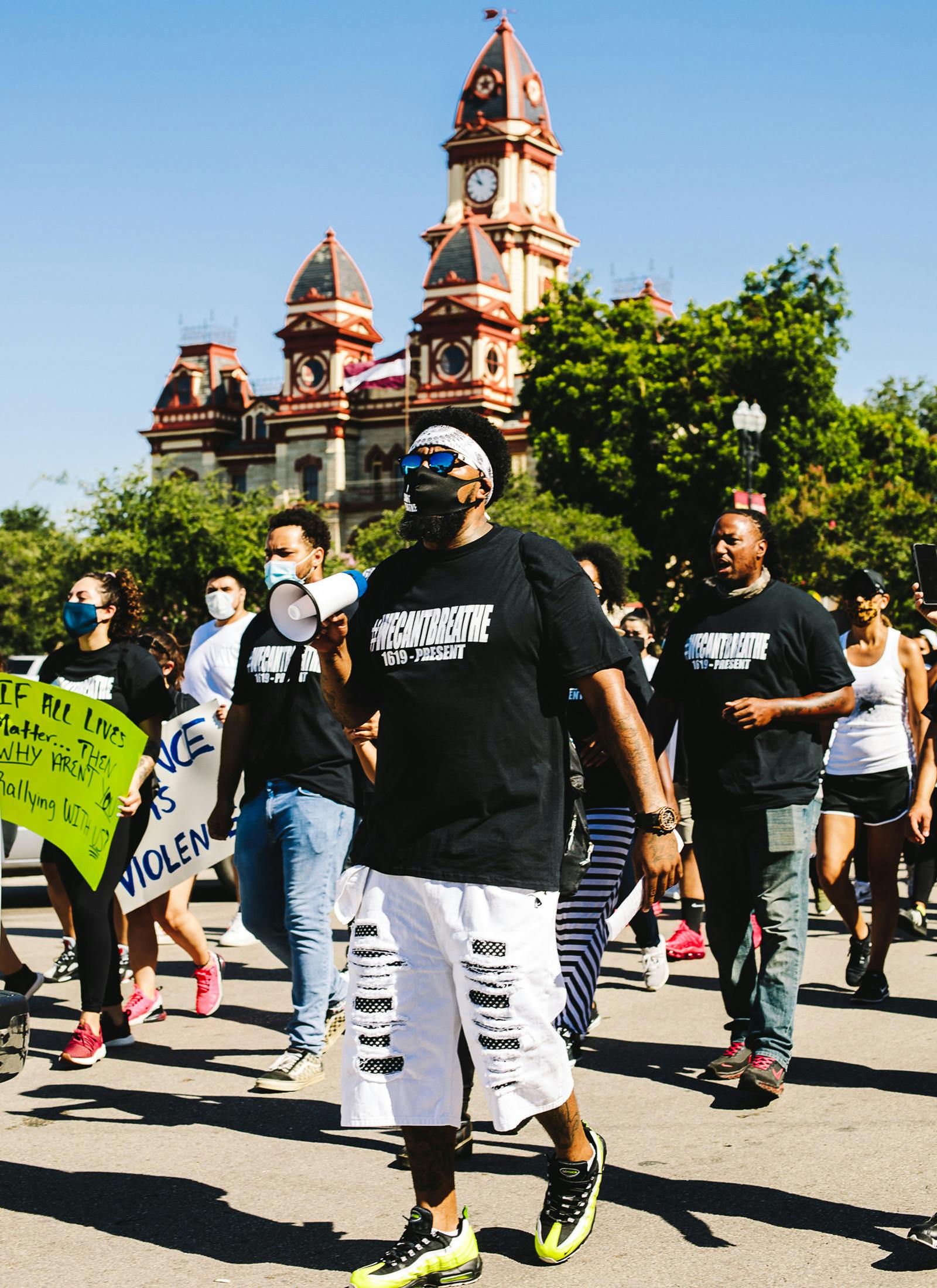 Joe Rollins leads protesters in a chant near Lockhart’s historic courthouse building during a civil rights march celebrating the life of George Floyd on Saturday, June 13.