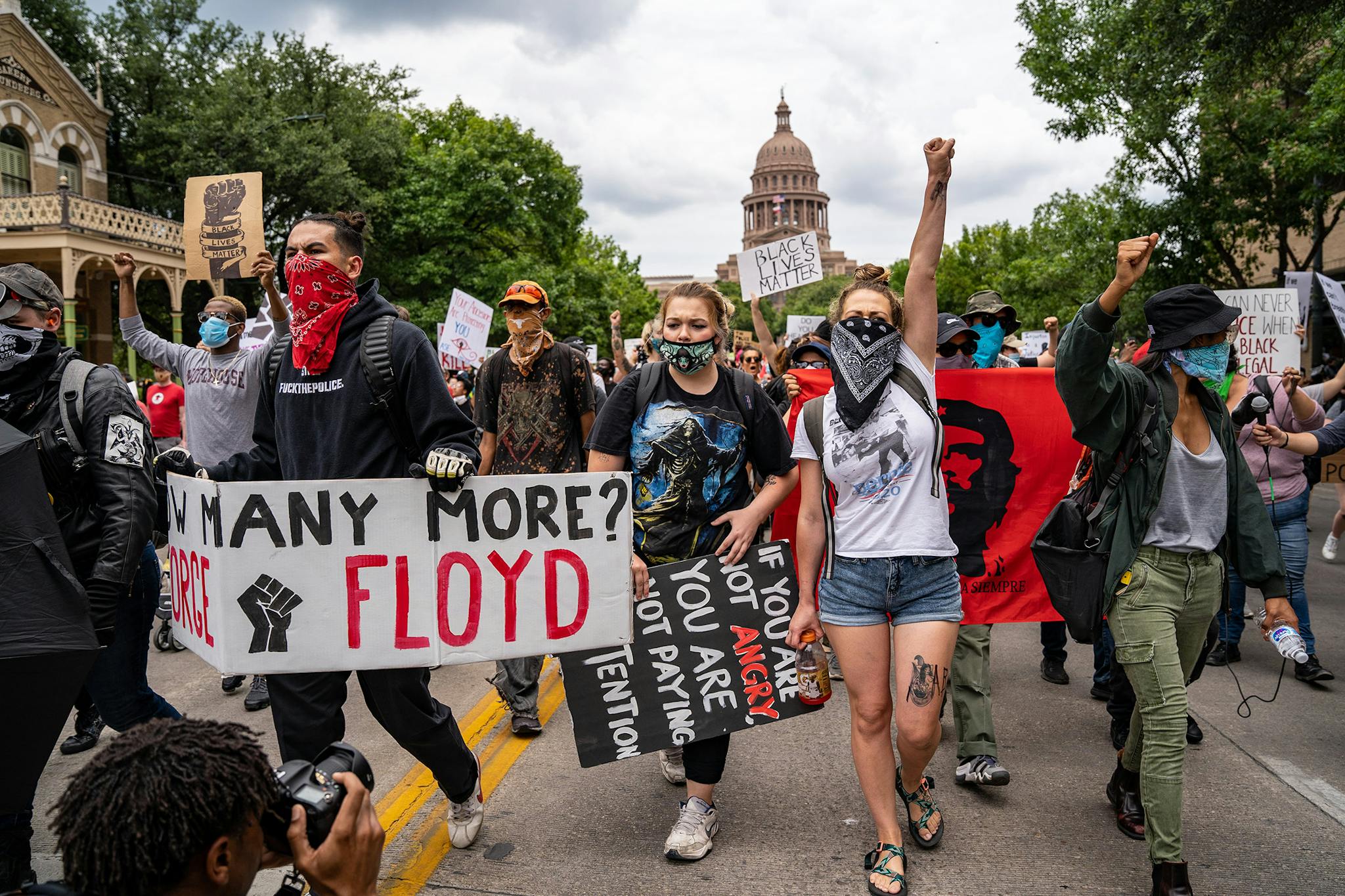 Protesters march on Congress Avenue in Austin on May 31, 2020, after the killing of George Floyd, an unarmed black man in Minnesota, sparks nationwide outrage.