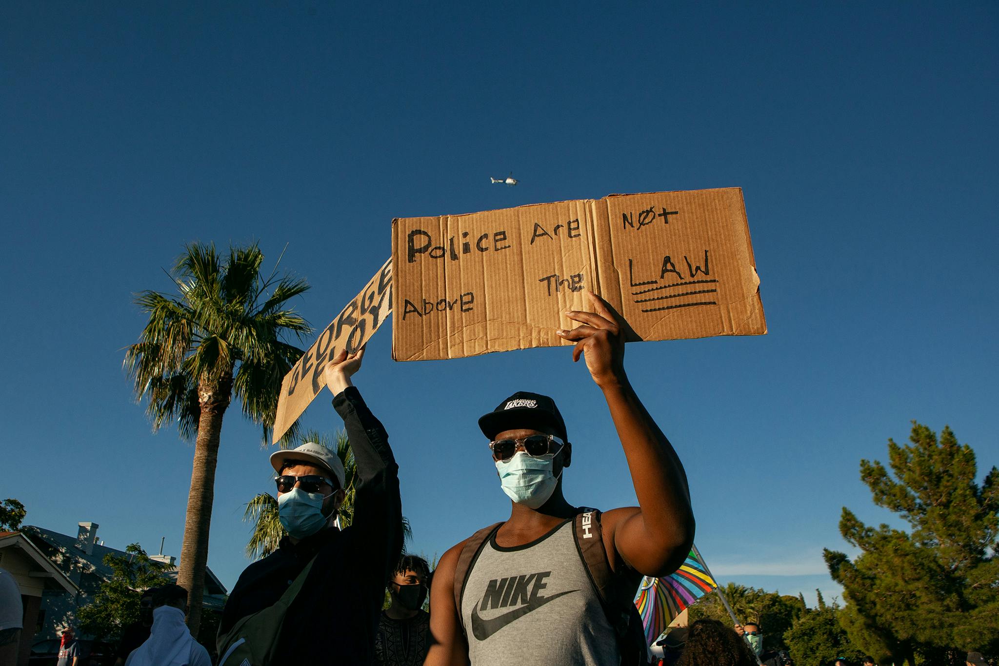 Protesters begin a march from Memorial Park to police headquarters in El Paso on May 31, 2020. A Customs and Border Patrol helicopter provided surveillance during the protest against police brutality.