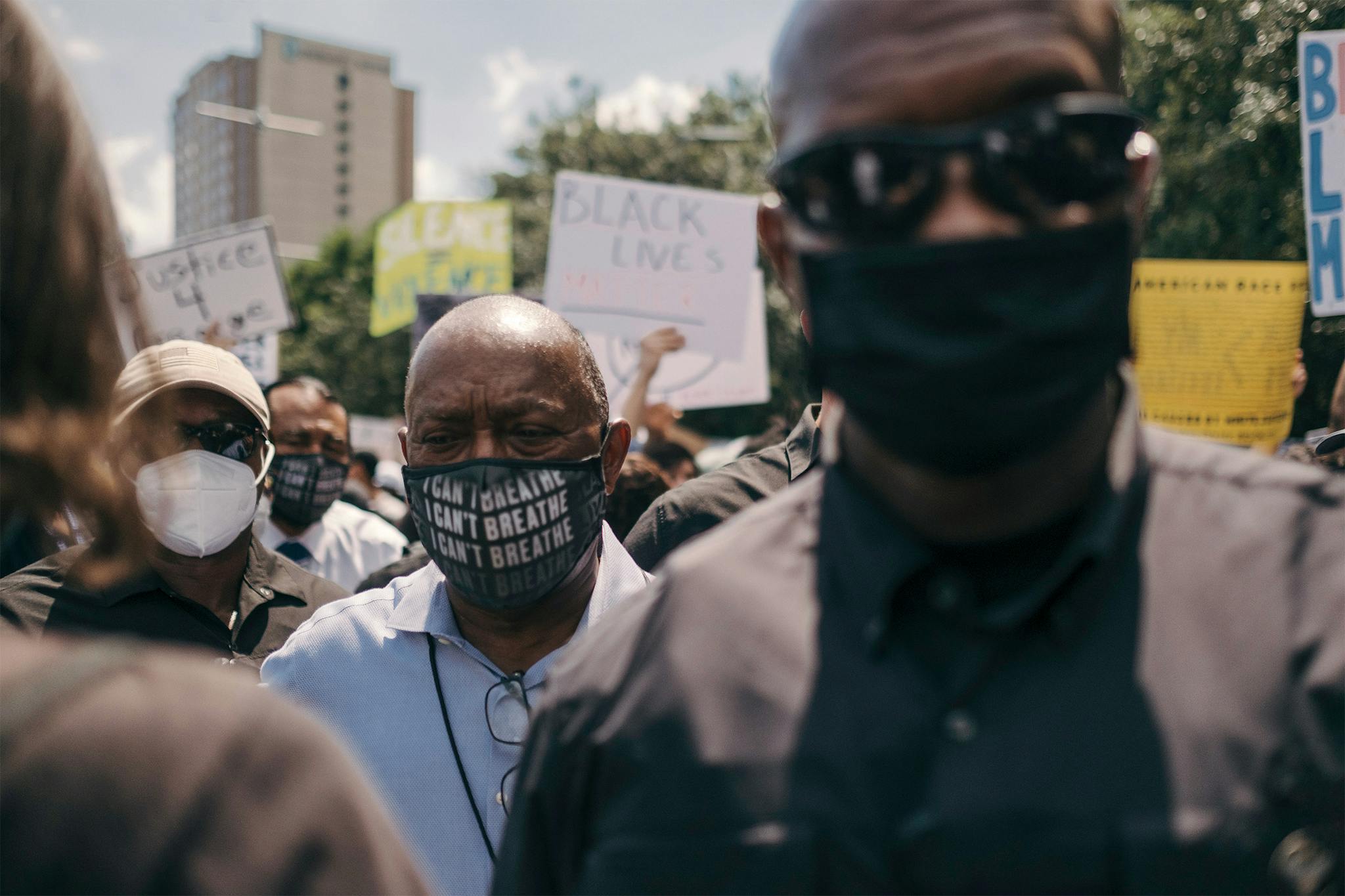 Mayor Sylvester Turner wears an "I Can't Breathe" mask during a march to honor the memory of George Floyd in downtown Houston on June 2, 2020.