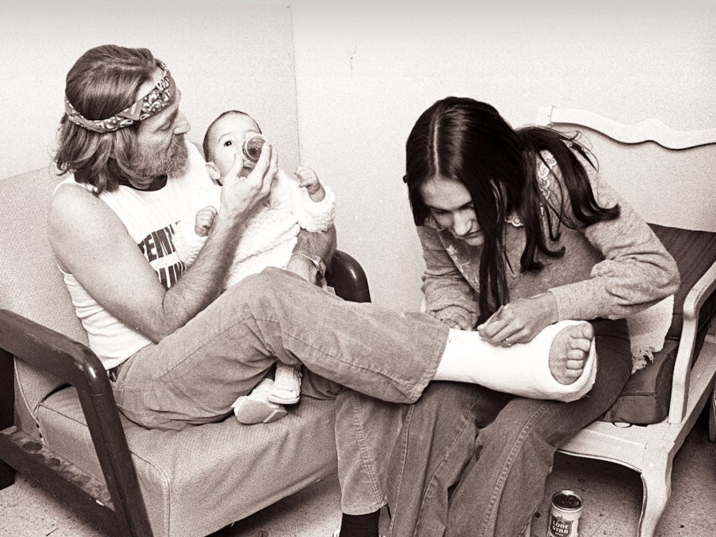 Willie with his granddaughter Rachel and his daughter Lana in one of the Opry House’s back rooms in 1977.