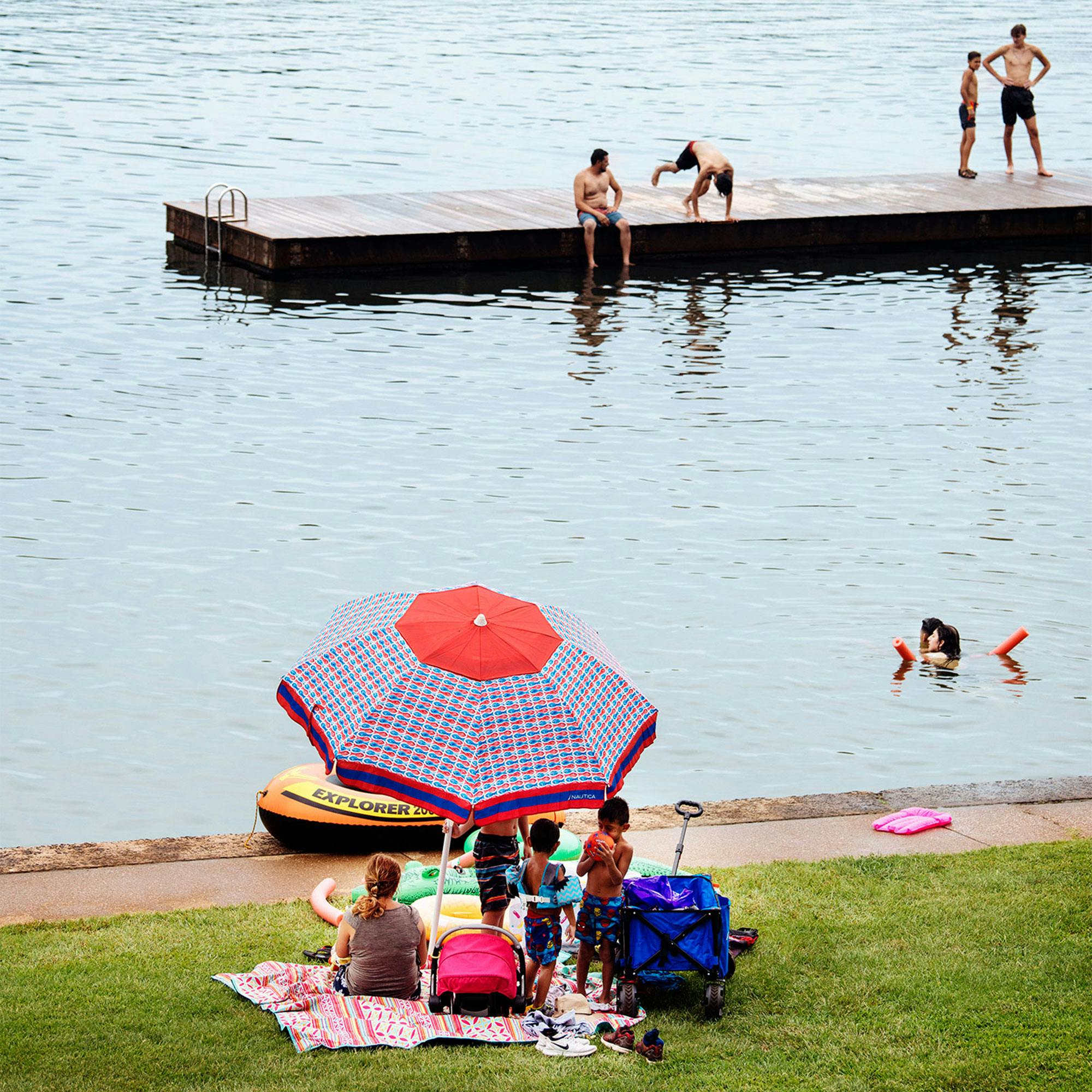 Carefree park-goers enjoying the lake pre-pandemic, in August 2019.
