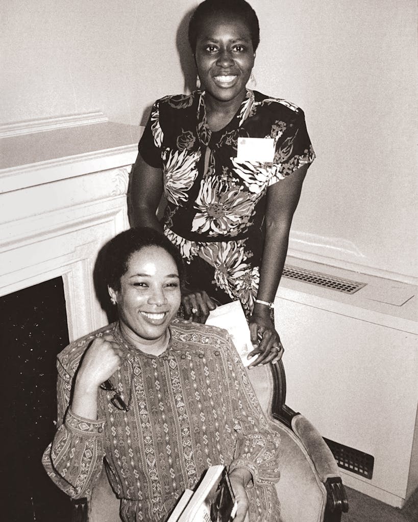 Stephens (seated) with author Elsie B. Washington