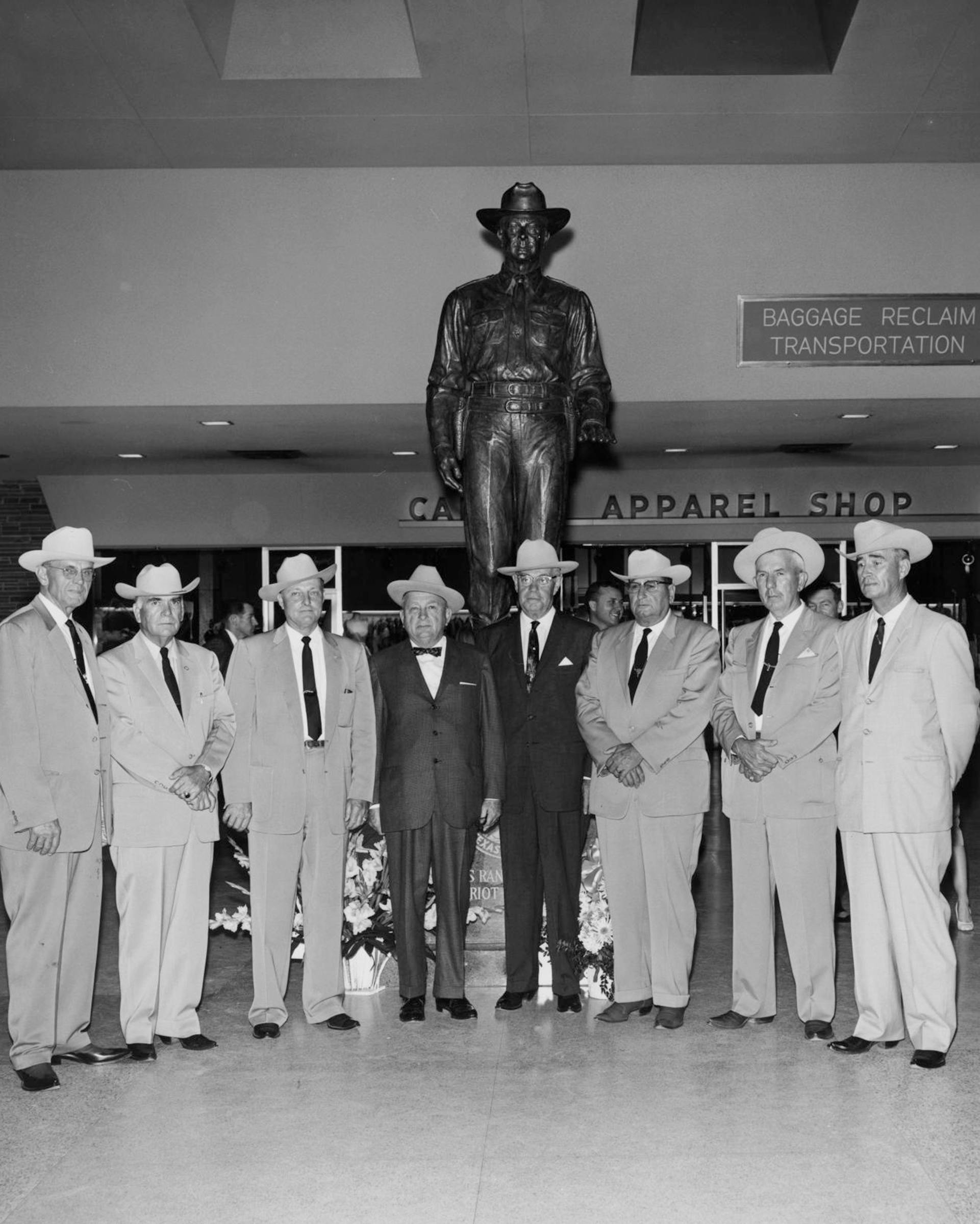 Eight Texas Rangers attending the unveiling of the Texas Ranger of Today sculpture, at Dallas Love Field