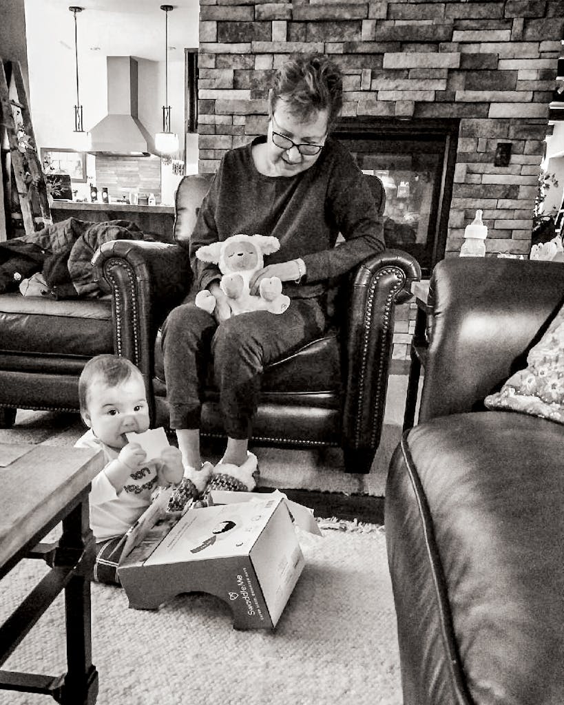 The author’s mother, Deborah Zamora, plays with his daughter, Zamora, in late January.