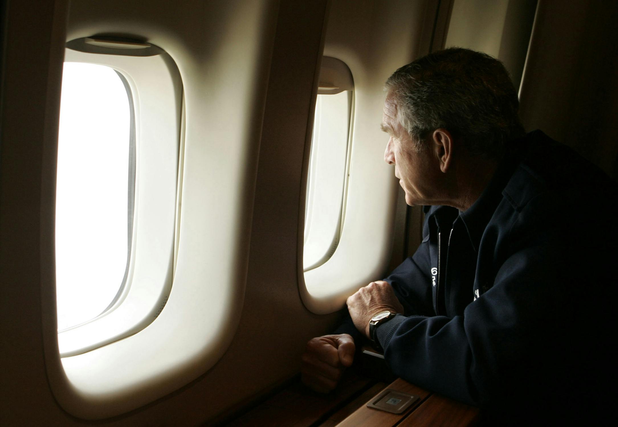 President Bush looks out the window of Air Force One