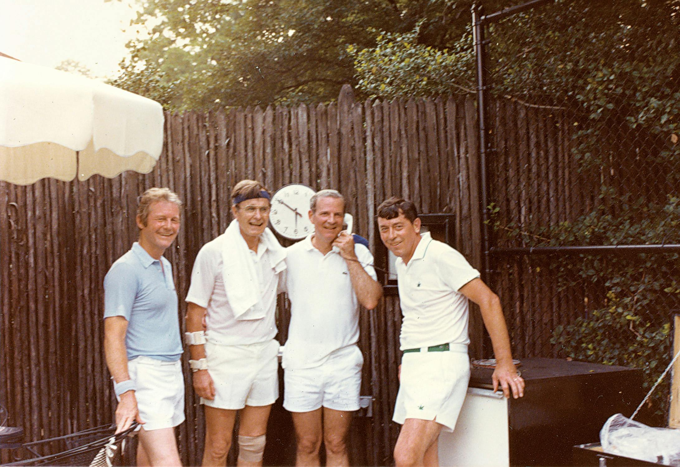 George H. W. Bush and James Baker on the White House tennis courts.