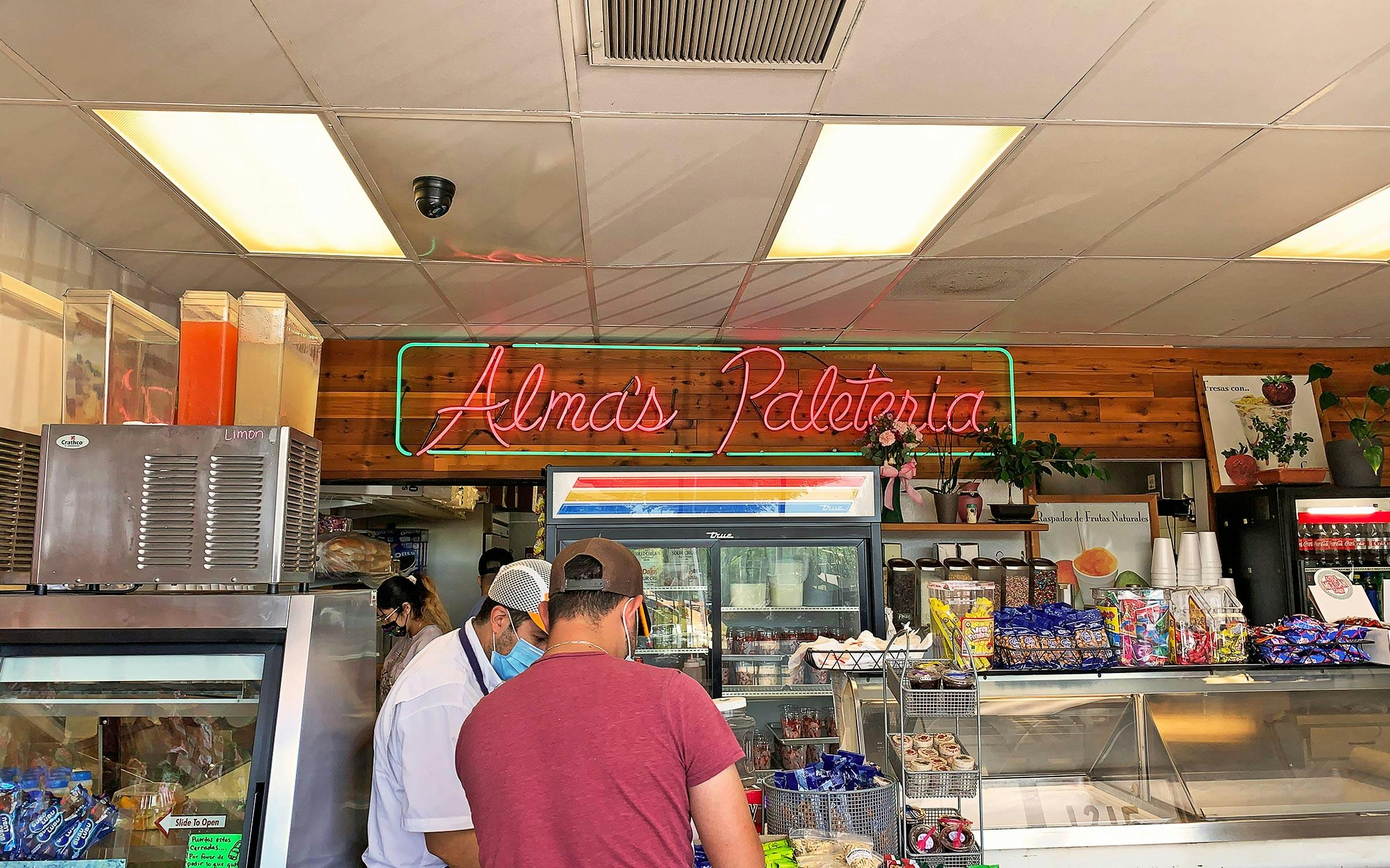 alama's-paleteria-busy-counter-neon-sign