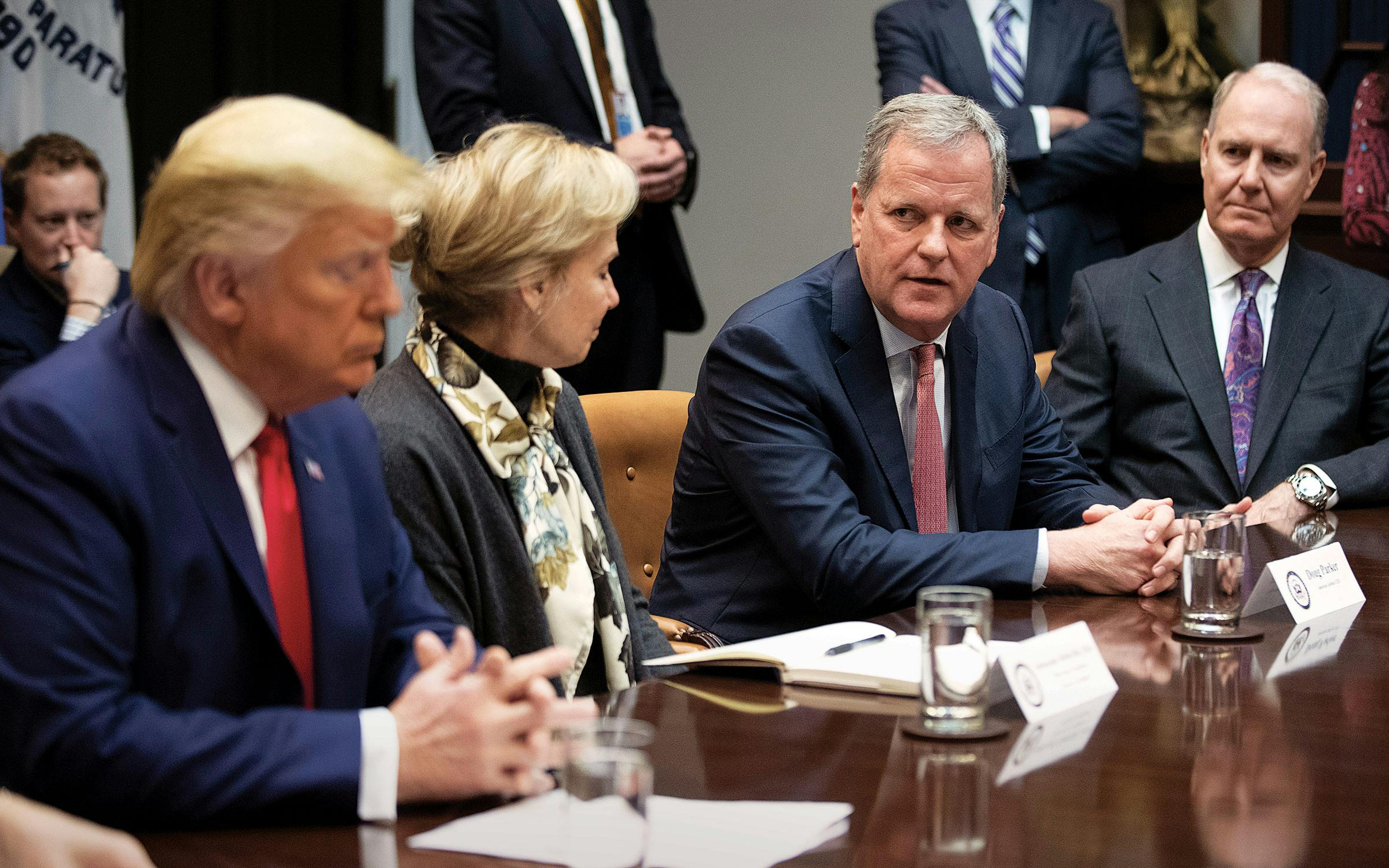 American CEO Doug Parker, second from right, with Southwest CEO Gary Kelly, right, at the White House on March 4, 2020.