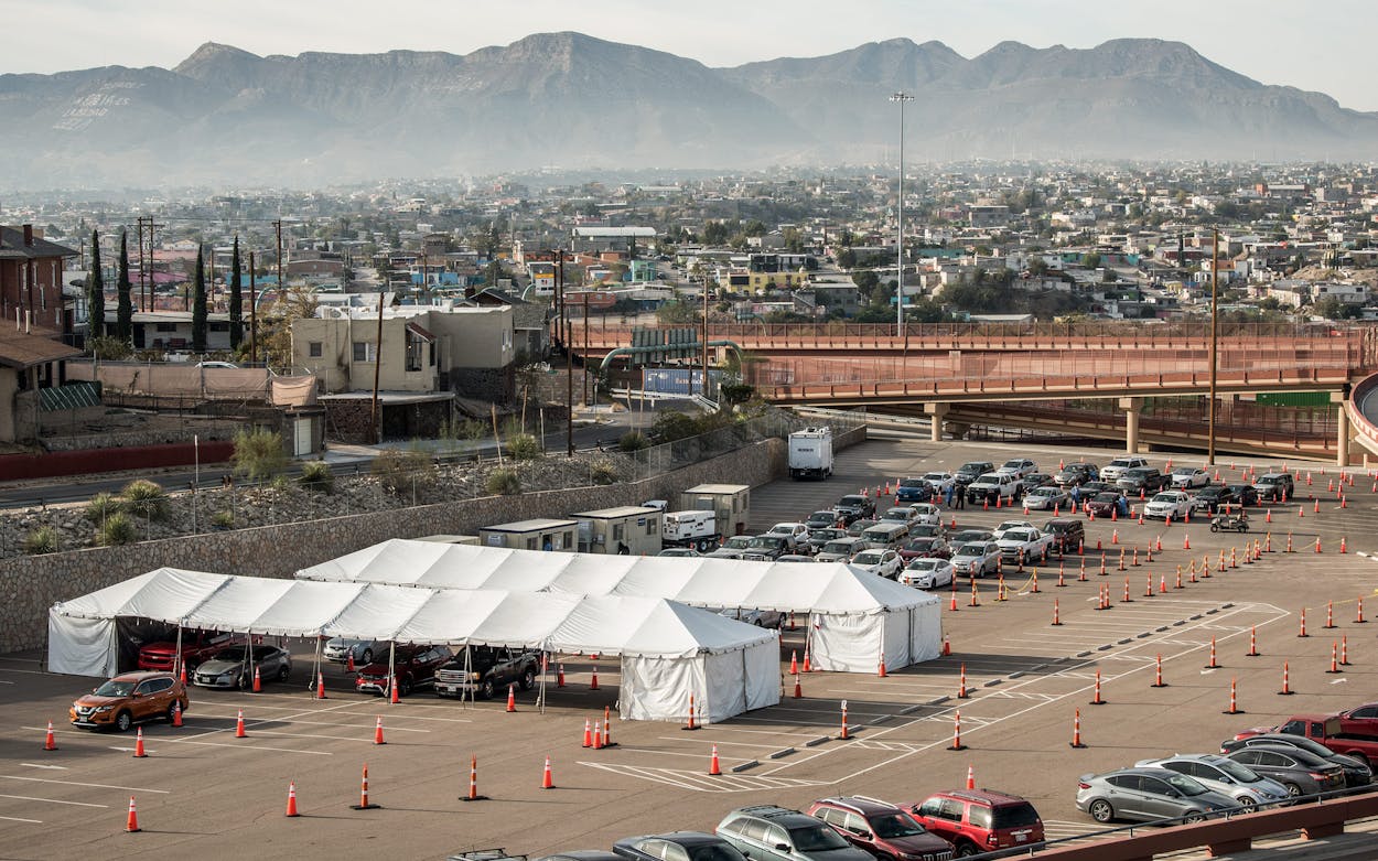 Cars pass through a coronavirus testing site at the University of Texas El Paso on October 31, 2020 in El Paso.