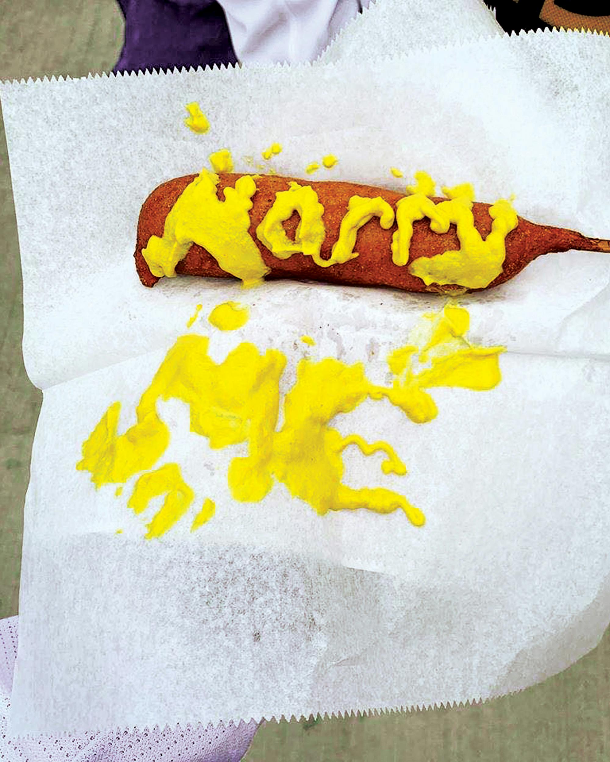A man used mustard on a corn dog to propose to his fiancée