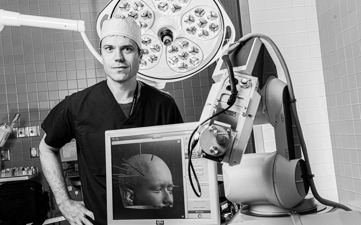 Dr. Bradley Lega, a UT Southwestern neurosurgeon who treats epilepsy and brain tumors, studies his patients’ brain waves associated with memory processing.