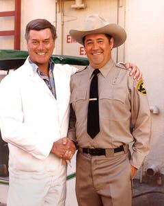 barry corbin with larry hagman on the set of Dallas. 