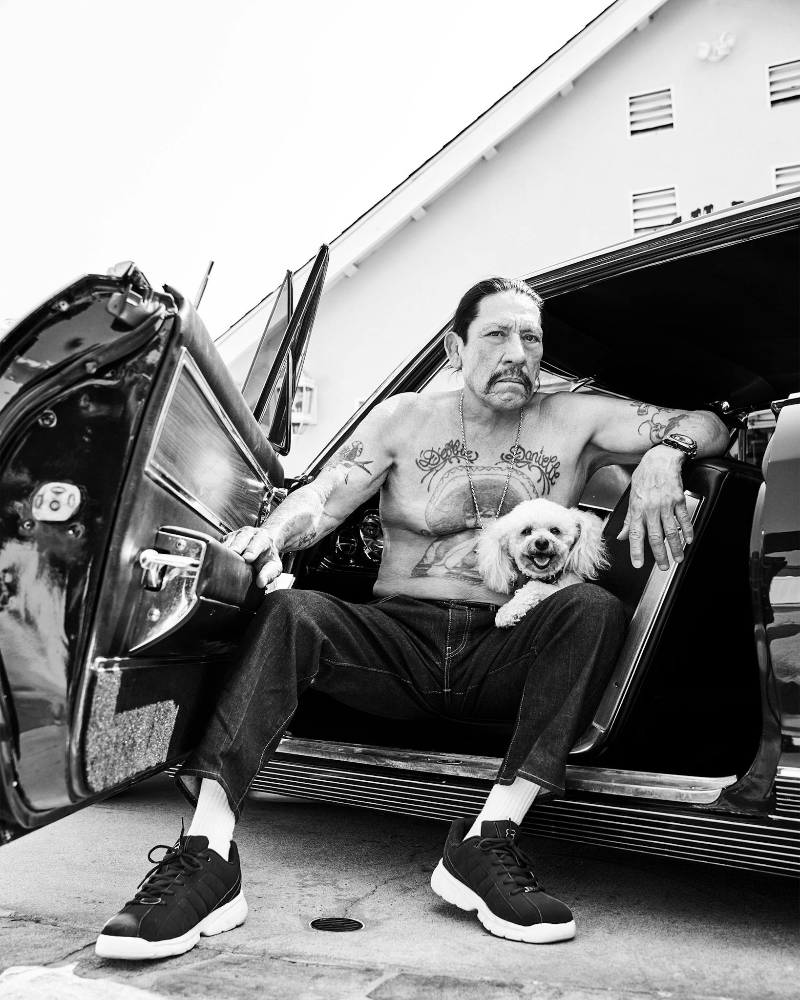 Danny Trejo and one of his dogs, Zelda, outside his home in Mission Hills, California.