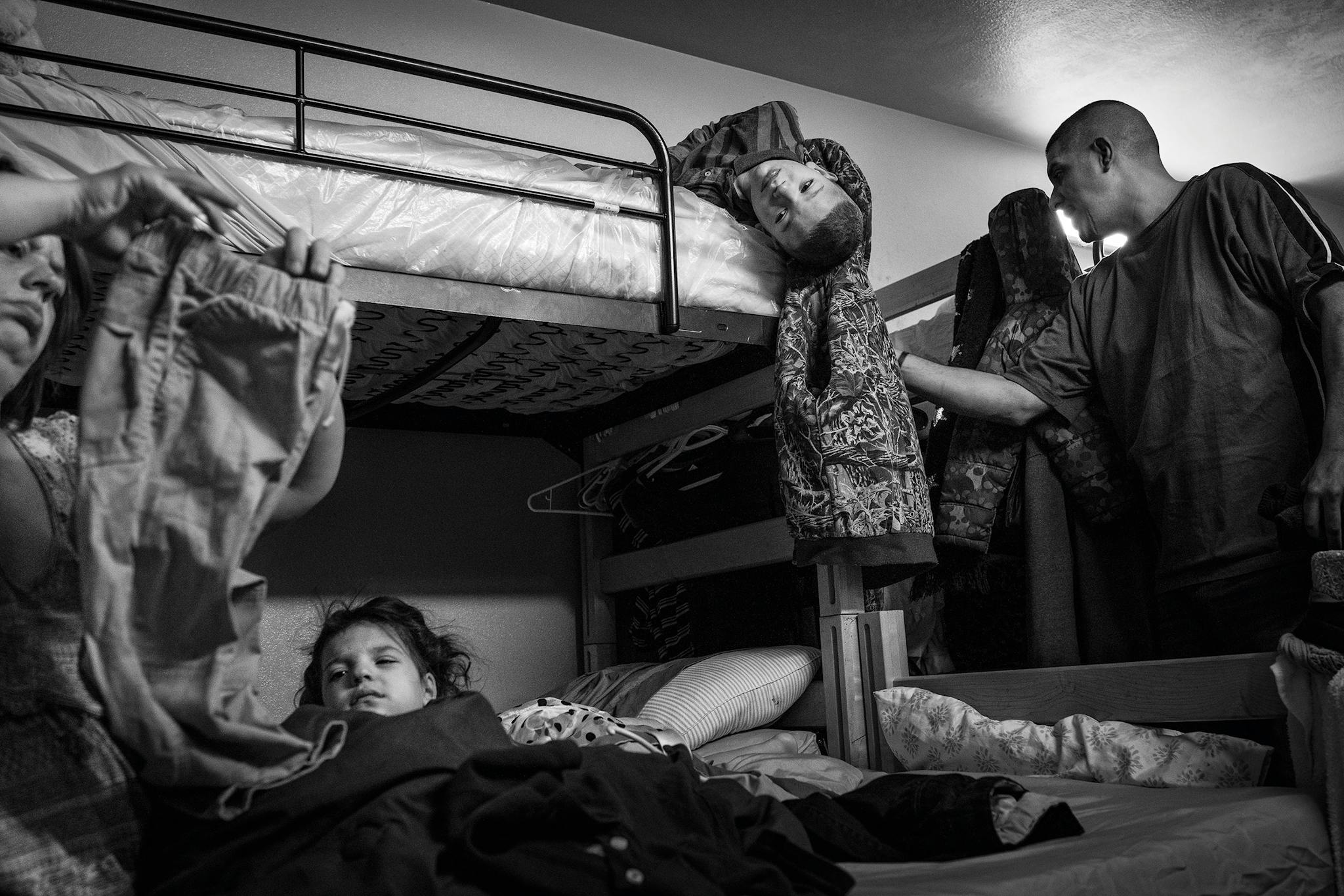 Early one morning in January 2019, Ezequiel and Jessica Pena wake up their children for school.