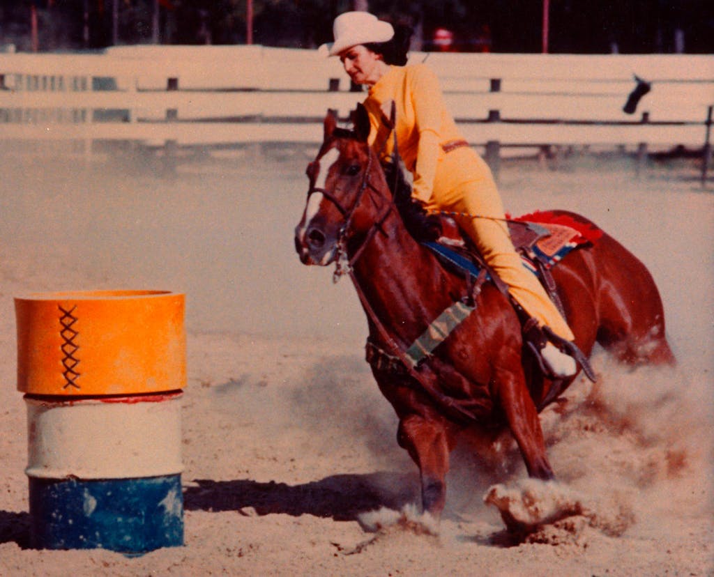 Martha rides Cebe Reed in the National Finals Rodeo, circa 1969.