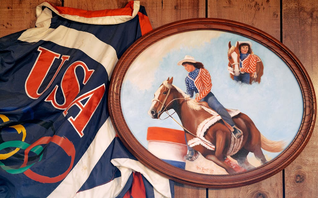Memorabilia from the 1988 Winter Olympics in which Martha was a part of the USA barrel racing squad hangs on a wall at Josey Ranch.
