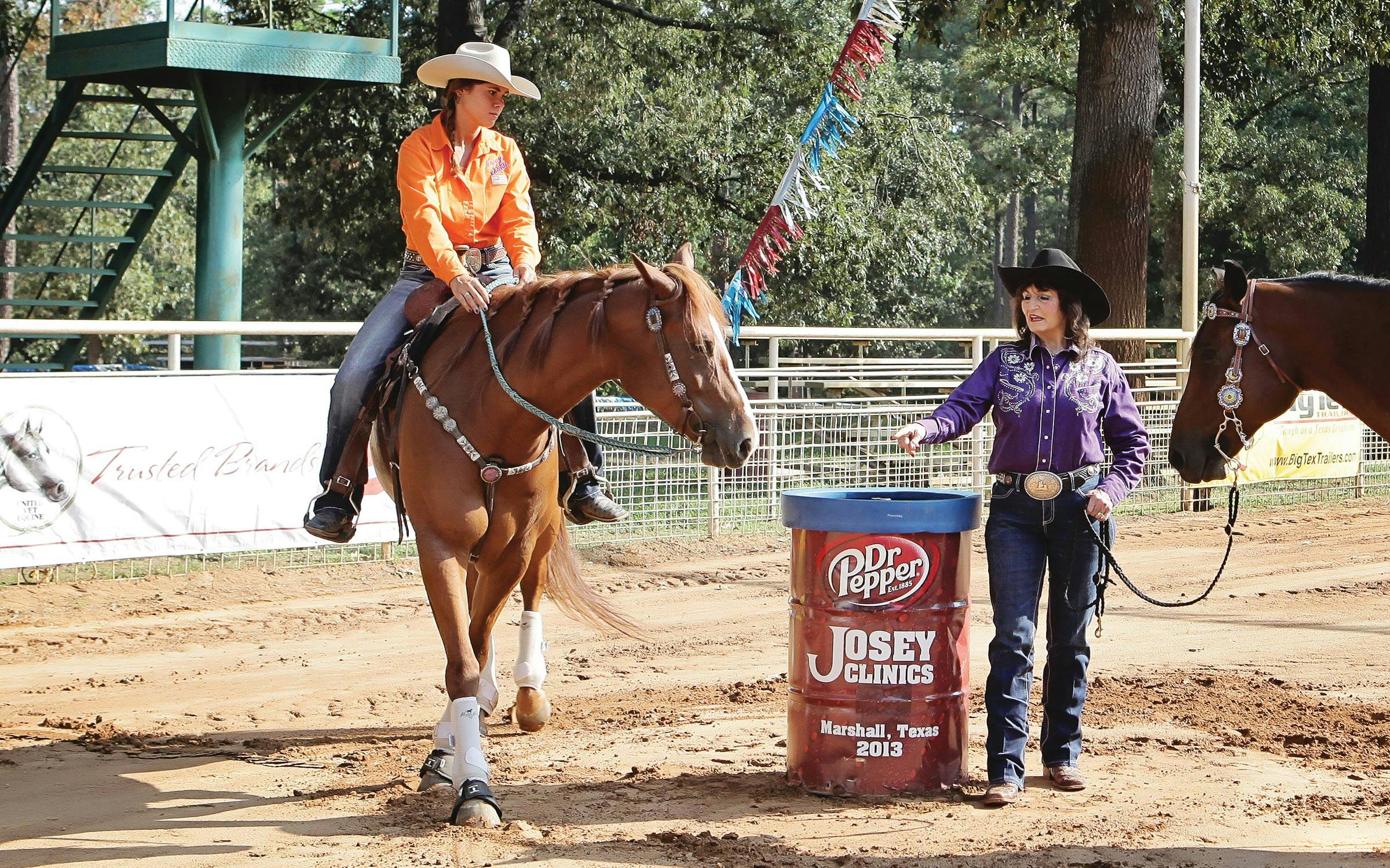 Martha instructs a student at one of her clinics at Josey Ranch in 2013.