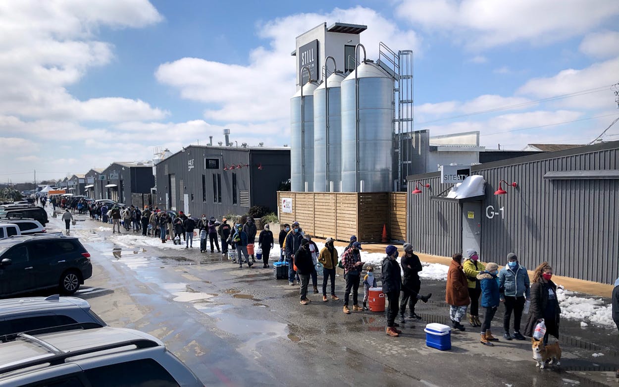 Austin residents wait to receive potable water at St Elmo Brewing on February 20, 2021.