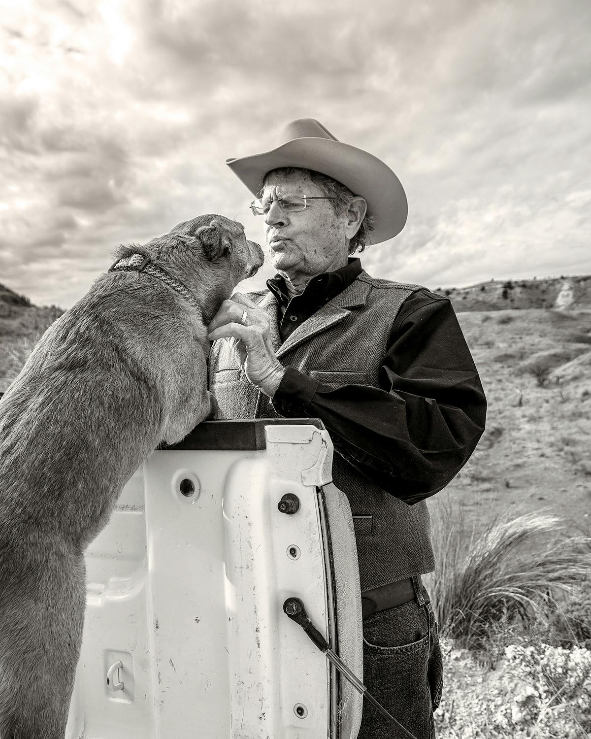 John Erickson and his dog Rosie stand eye-to-eye. 