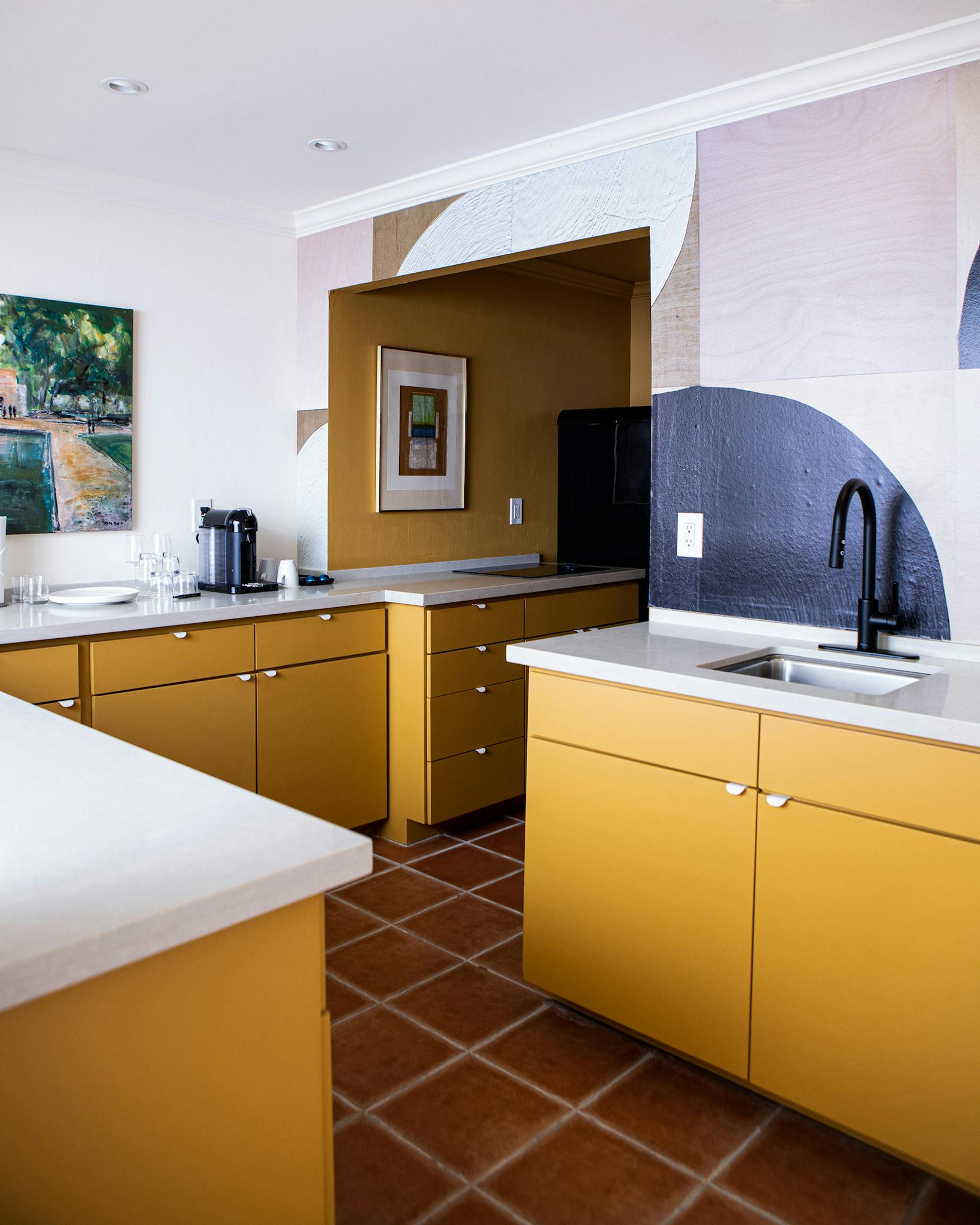 Though equipped with modern appliances, the retro kitchens have a midcentury modern vibe.