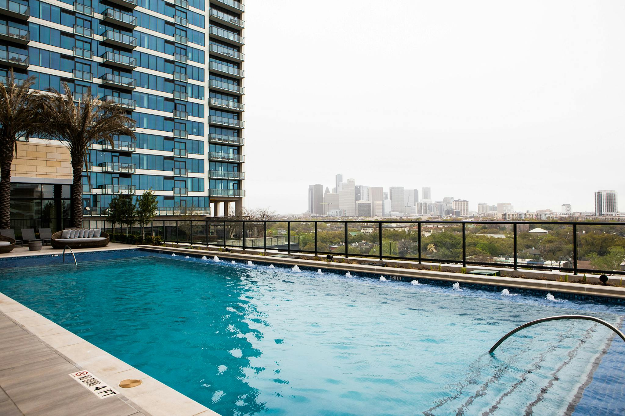 “You feel like you’re in this little European city,” Dan says about the hotel, where it even sounds like you’re across the pond: nearby church bells ring in crisply throughout the day. But the view of downtown Houston from the pool is unmistakeable.