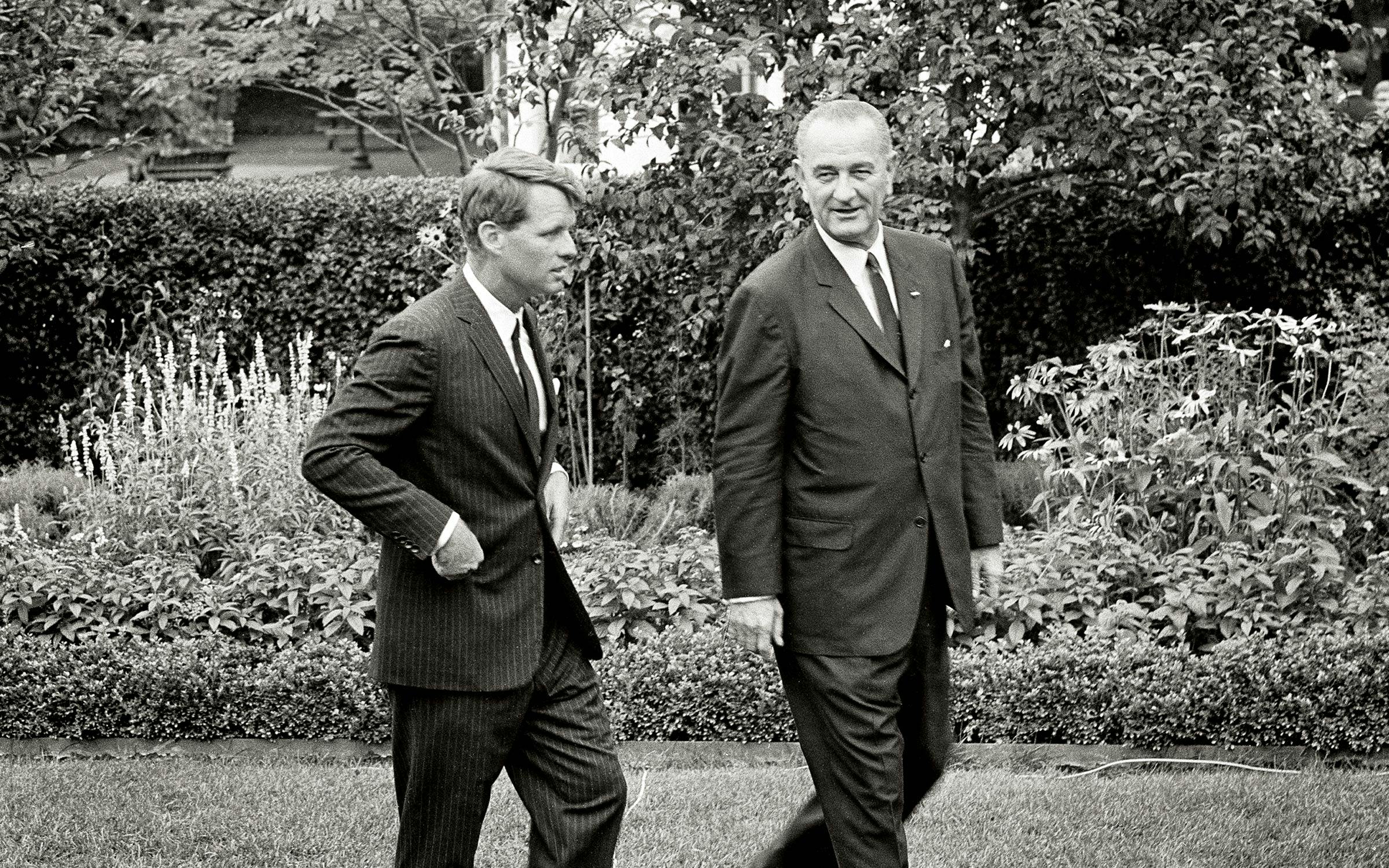 Robert F. Kennedy and Lyndon B. Johnson on the White House lawn. 