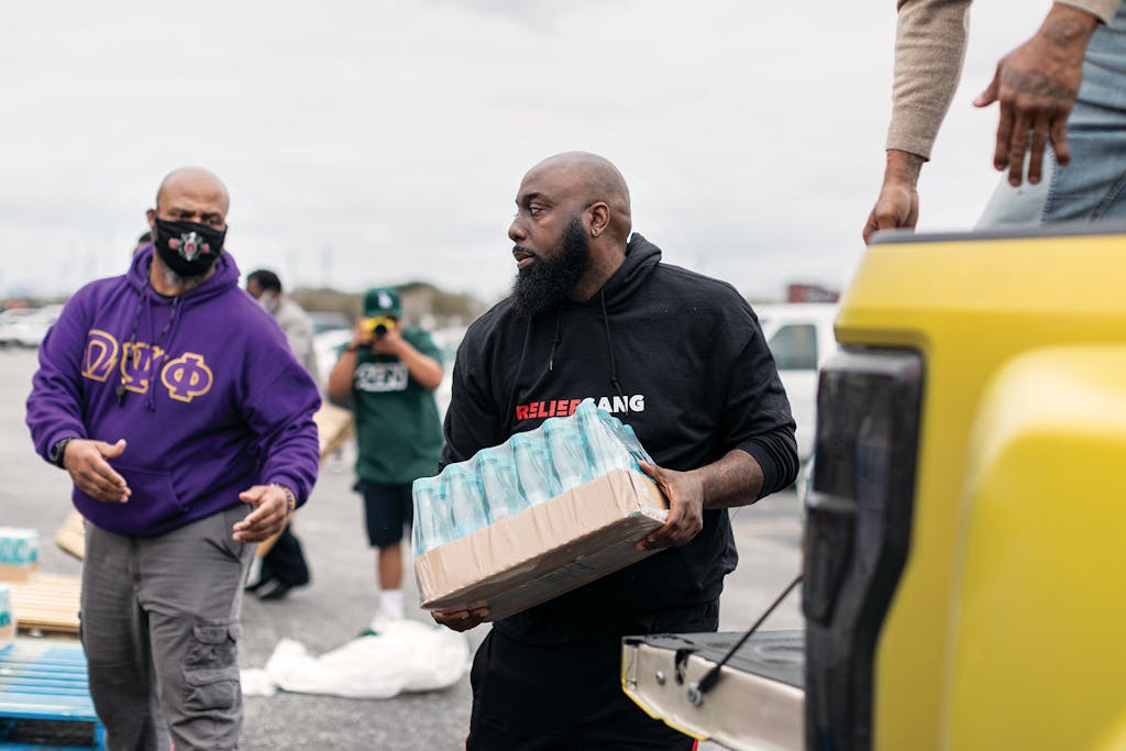 Trae handles a case of water in Houston on February 20, 2021.