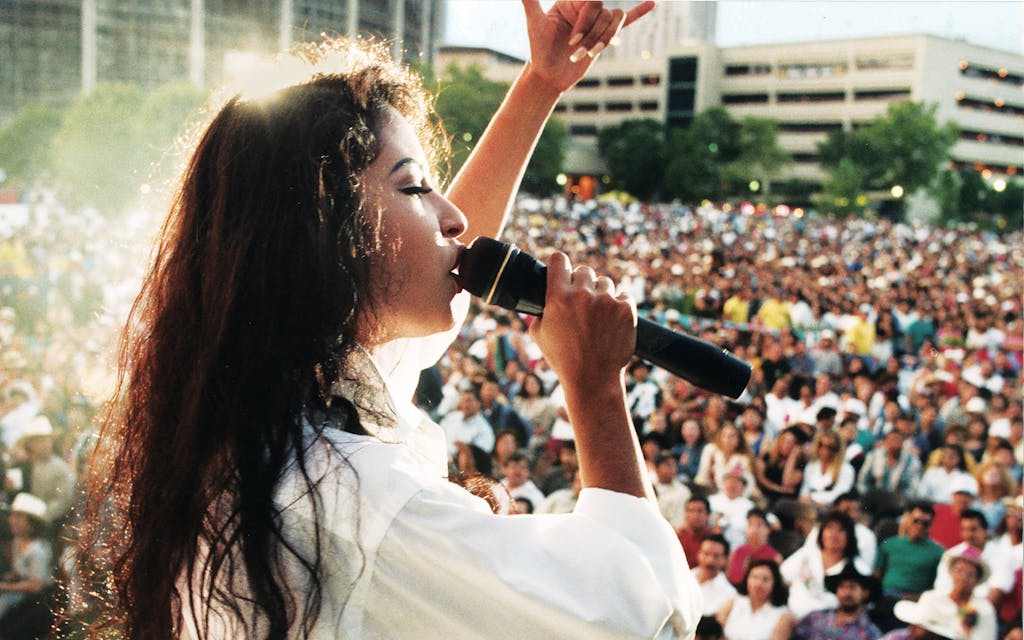 Selena, in a white button-down, in San Antonio, on April 24, 1994.