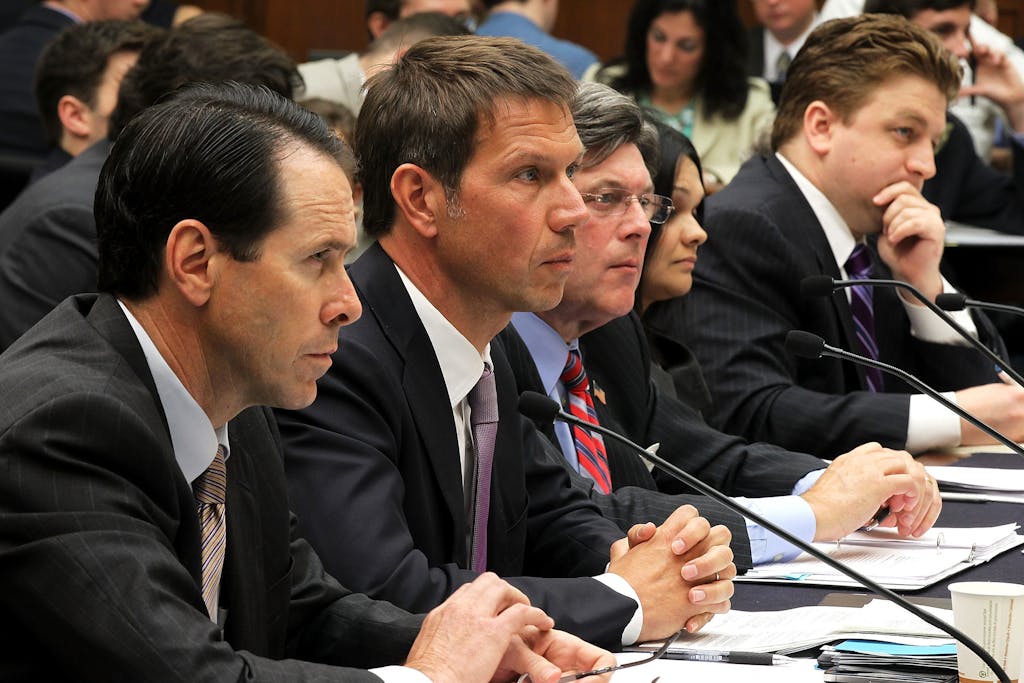 Chairman, CEO and president of AT&T Randall Stephenson (far left) and others testify during a hearing before the Intellectual Property, Competition and the Internet Subcommittee of the House Judiciary Committee to examine the proposed merger between AT&T and T-Mobile, May 26, 2011 in Washington, DC.