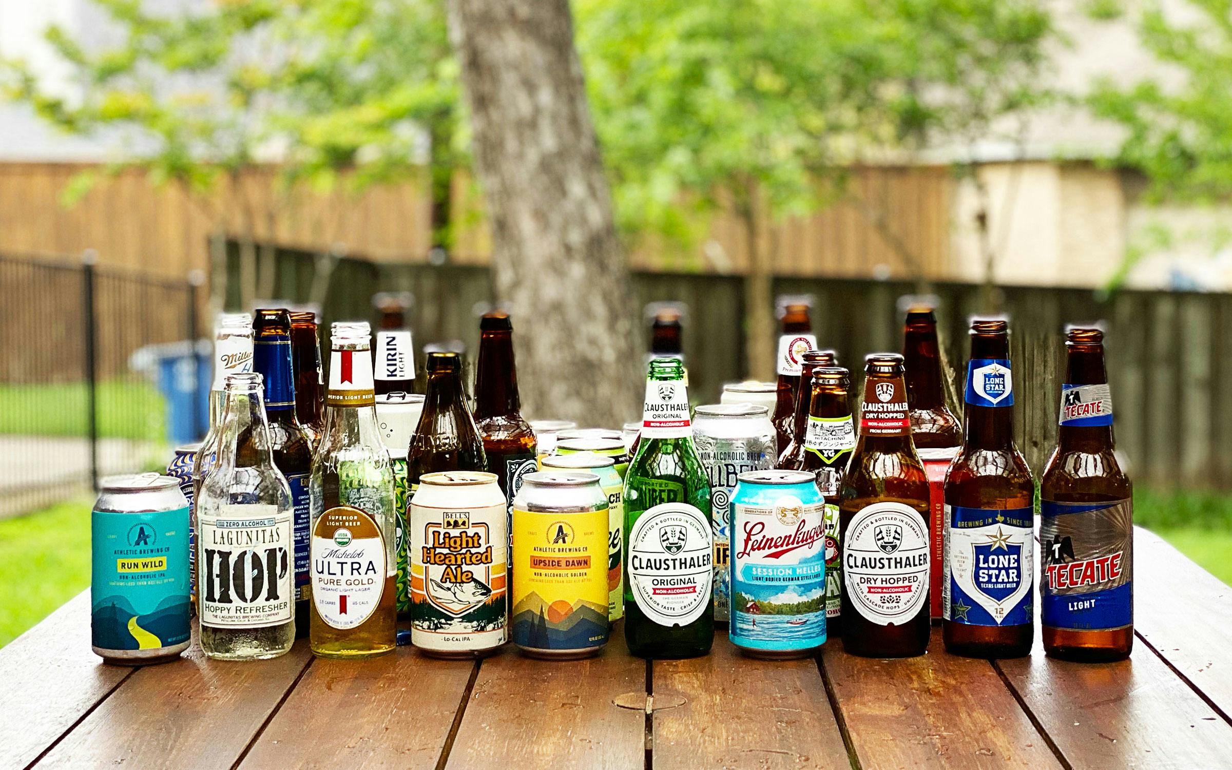 https://img.texasmonthly.com/2021/05/bbq-low-abv-beers-1.jpg?auto=compress&crop=faces&fit=fit&fm=pjpg&ixlib=php-3.3.1&q=45