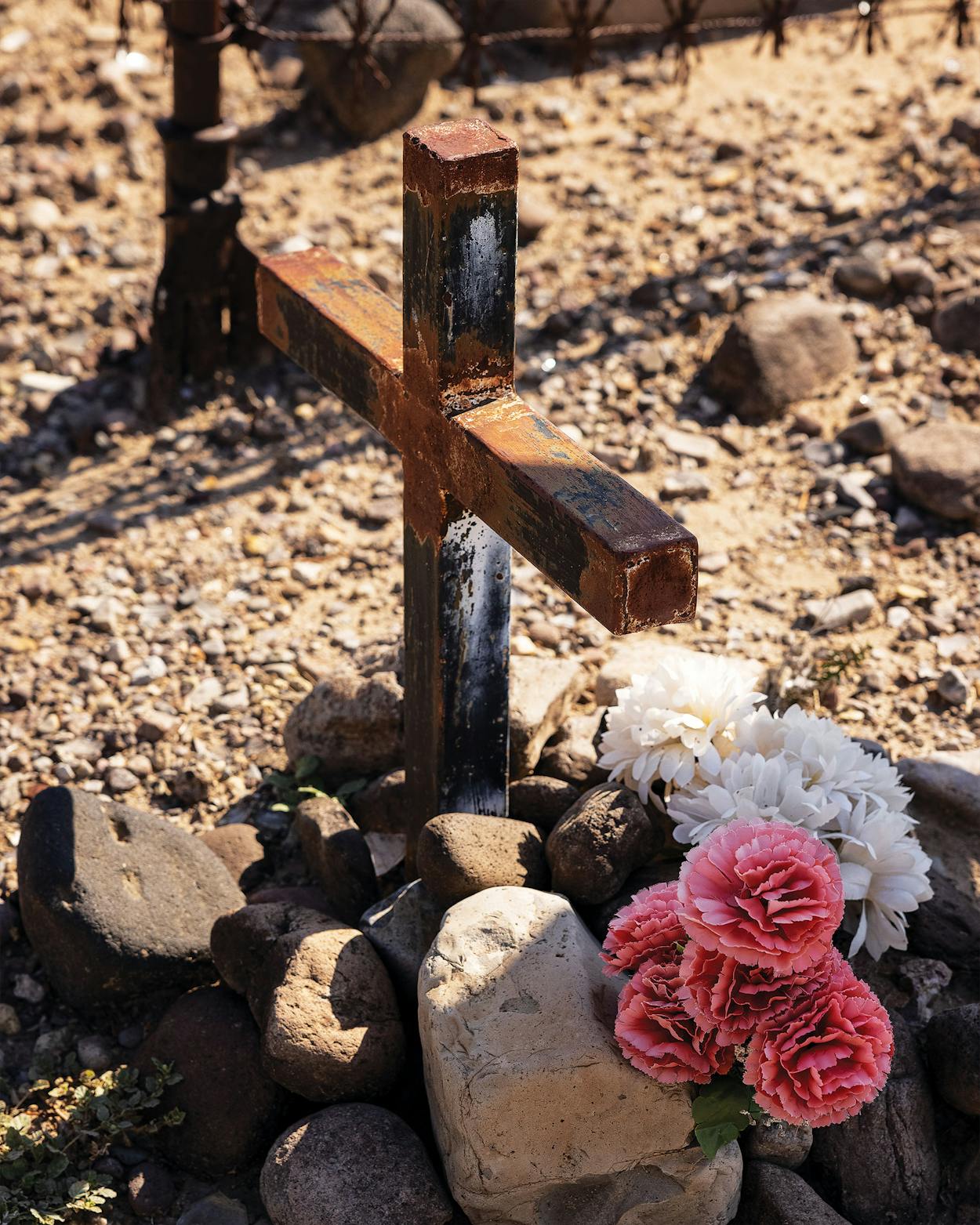 One of two metal crosses in the Cementerio del Barrio de los Lipanes, in Presidio.