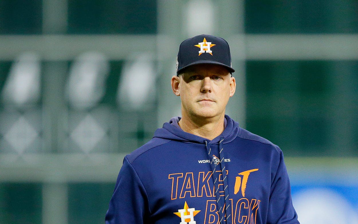 AJ Hinch #14 of the Houston Astros looks on during batting practice prior to Game Seven of the 2019 World Series against the Washington Nationals at Minute Maid Park on October 30, 2019 in Houston, Texas.