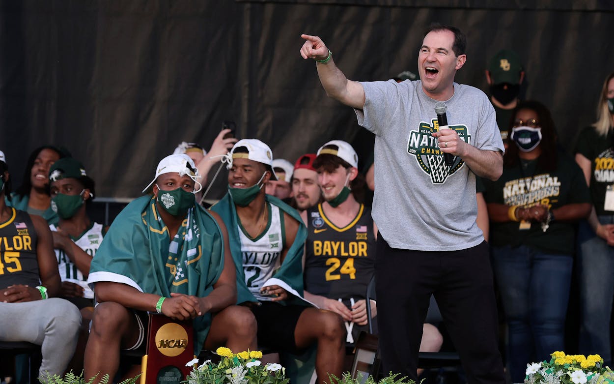 Baylor coach Scott Drew thanks former players as they celebrate their NCAA men's tournament championship Tuesday, April 13, 2021, in downtown Waco, Texas.