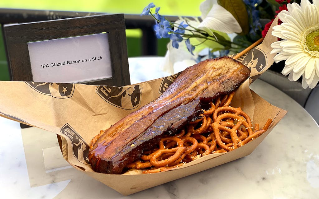 IPA glazed bacon on a stick at Toyota Stadium.