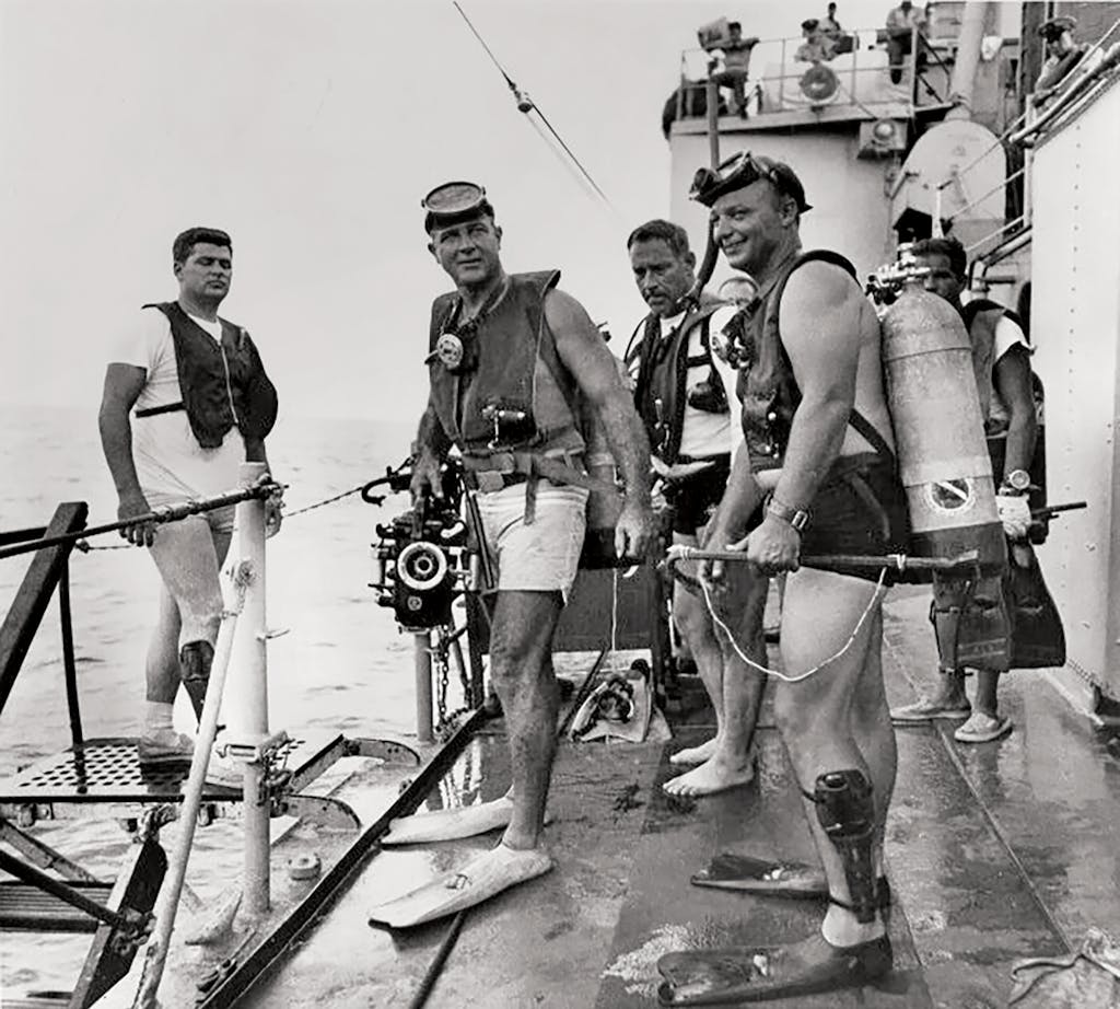 Divers, including Robert Woods (far left), preparing to jump in at Flower Garden Banks in 1967.