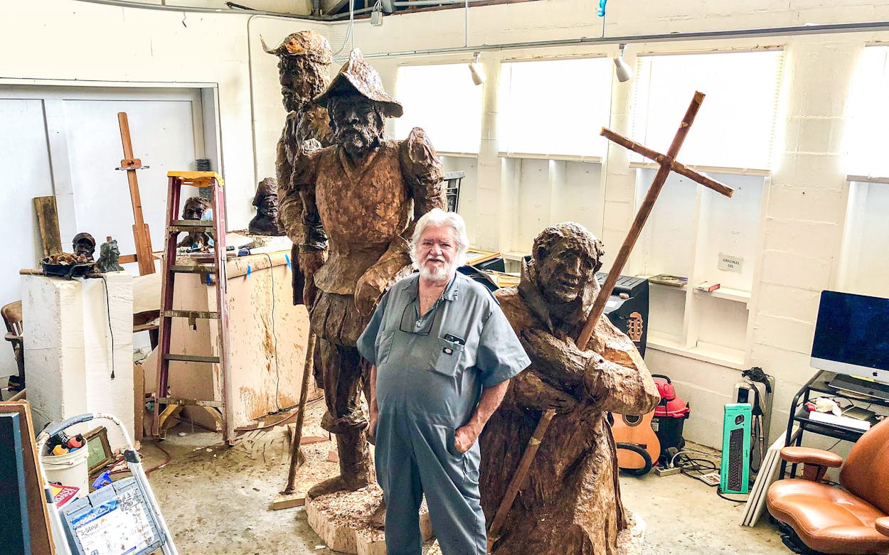 Artist Steve Russell poses inside his Rockport studio on July 7, 2021 alongside his latest project, 