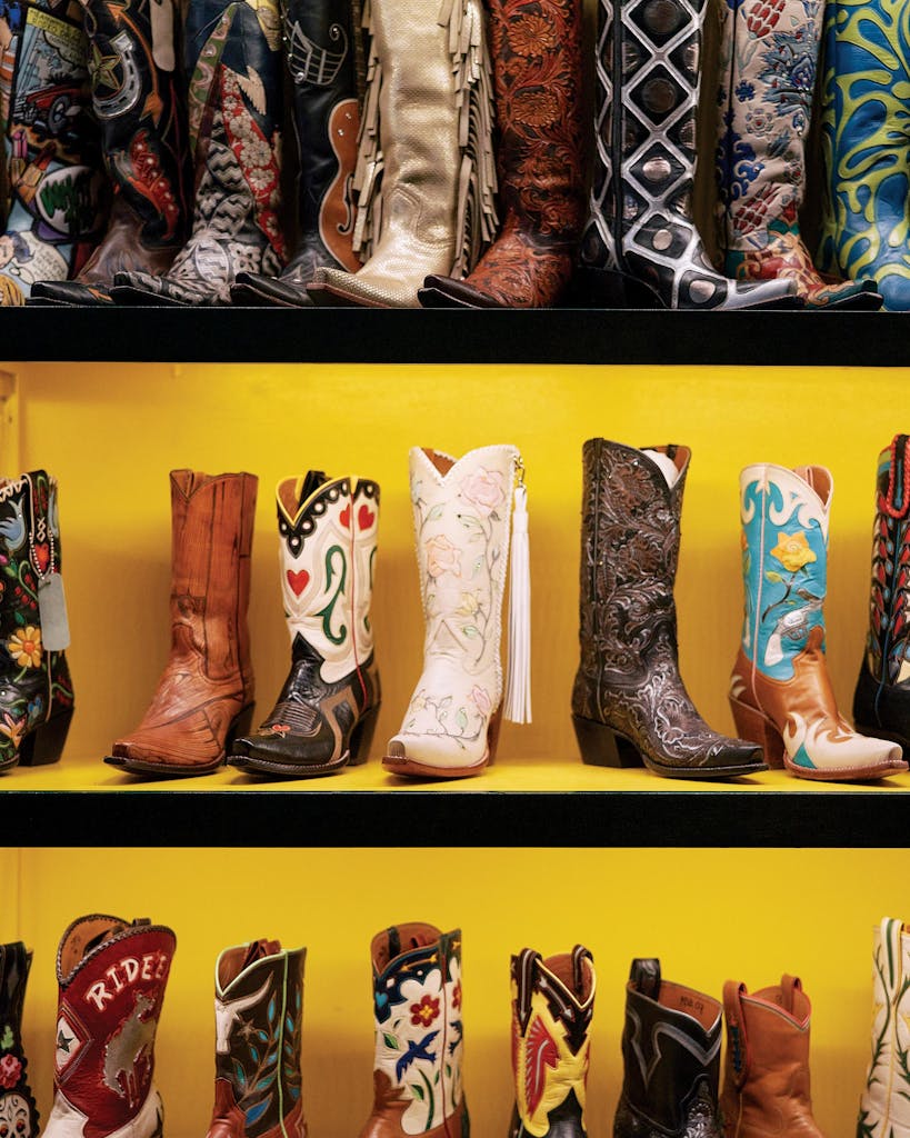 An assortment of styles sit on the shelf at Rocketbuster Boots.