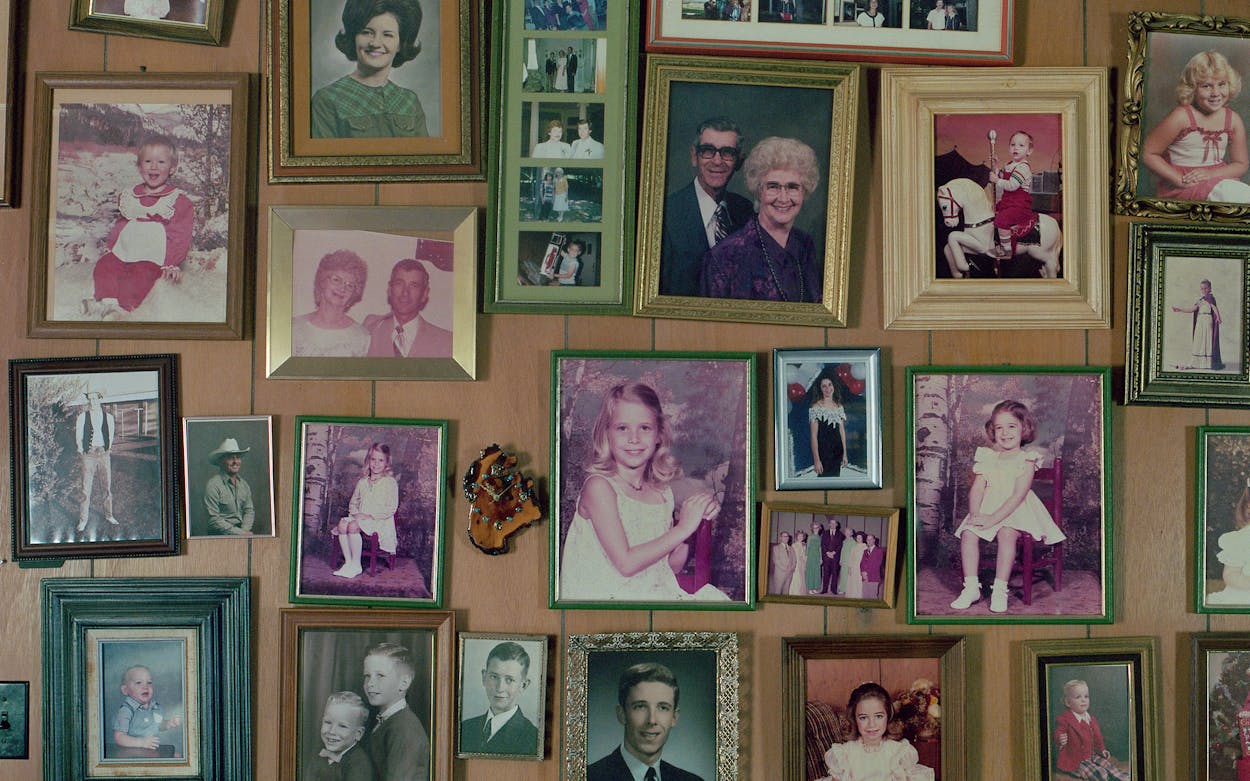 Old framed photographs of the Harkey family.