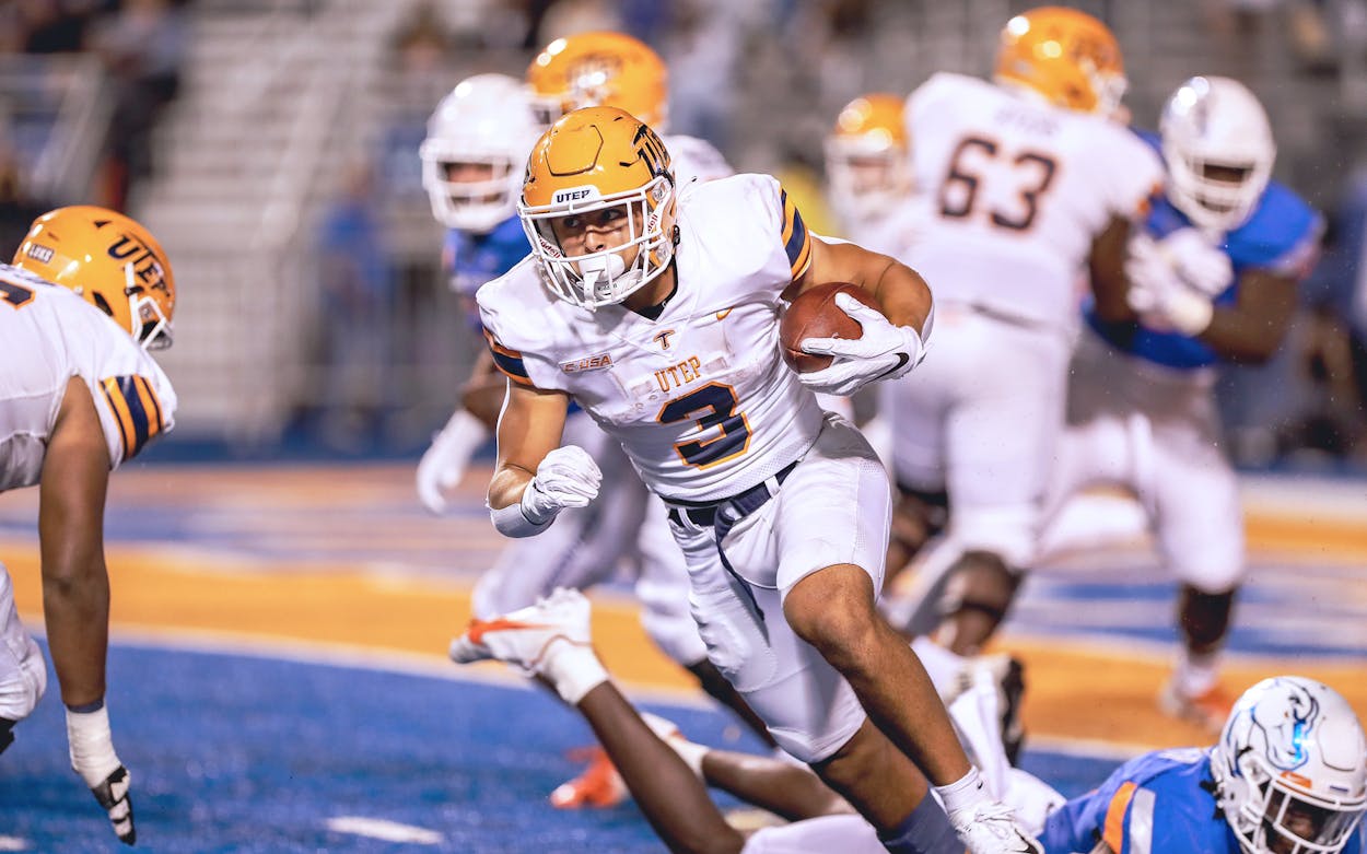 Running back Reynaldo Flores of the UTEP Miners runs the ball during the second half against the Boise State Broncos.