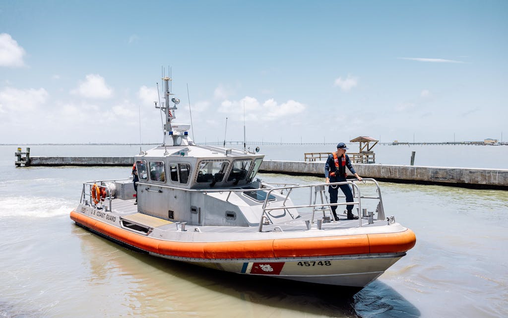 A U.S. Coast Guard boat returns to shore in South Padre Island on June 9, 2021.